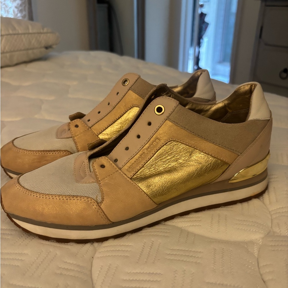 Stylish Michael Kors sneakers. Barely worn. Size 10.